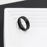 Black 3mm promise ring for him with a smooth minimalist band and polished finish