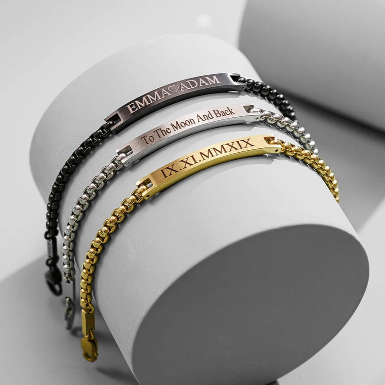 ersonalized engraved men's bracelets with custom names, dates, initials, and messages on sleek centre plates with beaded chains in golden, silver, and black.