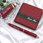 Custom name red and black wallet gift set with matching keychain and pen, featuring coordinated name engraving across the accessories.