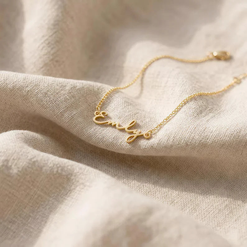 Golden  Chain Bracelet on beige fabric