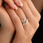 Woman wearing adjustable silver band ring with Emily and Sophia script names