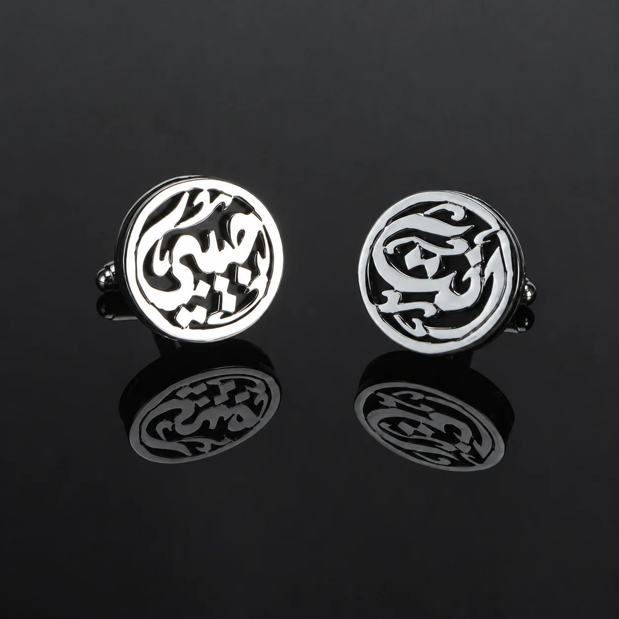 Personalized Arabic round name cufflinks featuring custom Arabic lettering in a circular design, displayed as a matching silver pair.