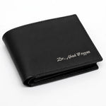 Custom name engraved black leather bifold wallet for men with minimalist stitching and sleek everyday design