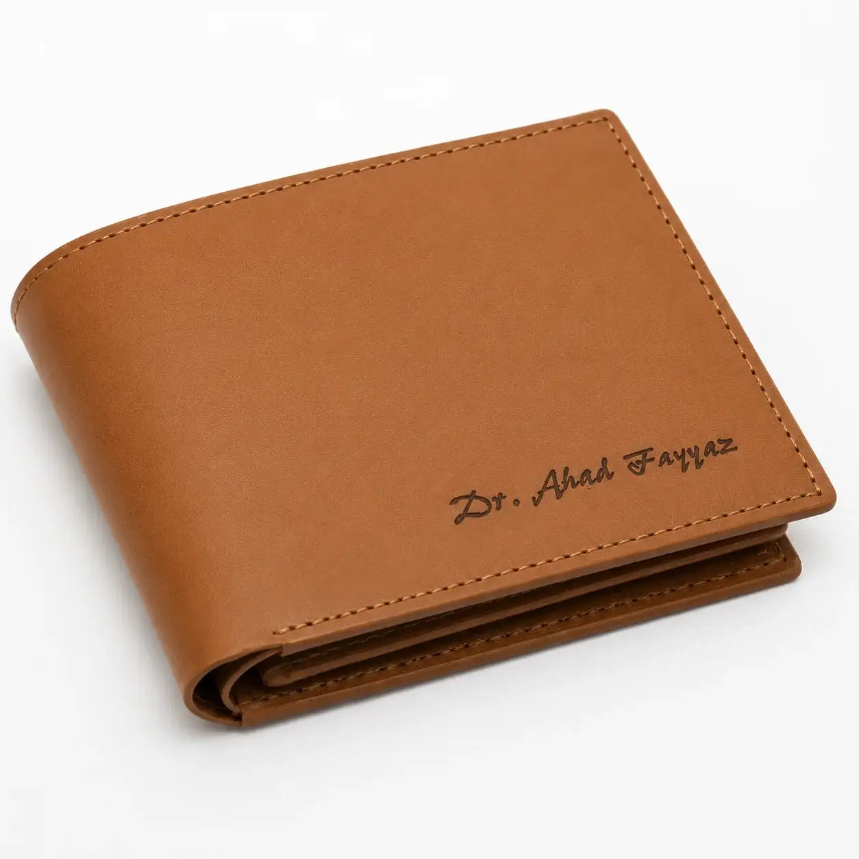Camel brown leather bifold wallet with custom name engraving, refined stitching, and a sleek minimalist design for everyday use