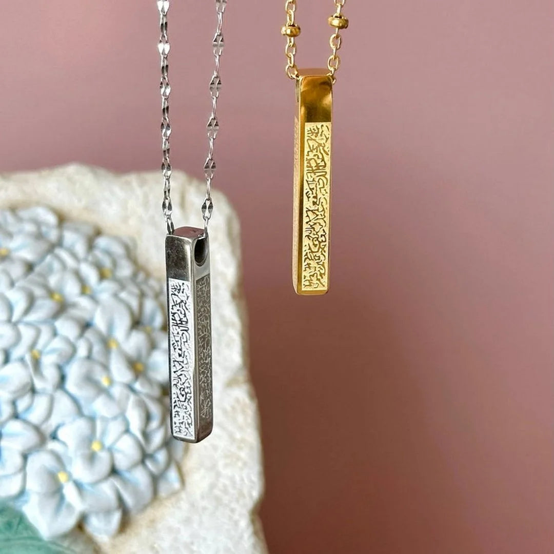 Gold and silver-colored bar necklaces with engraved Arabic calligraphy,