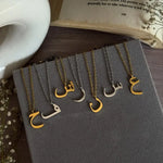 Arabic Initial Necklace Collection in Gold and Silver featuring personalized Arabic letter pendants for everyday wear.